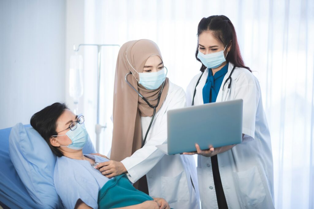 senior woman patient and young woman doctor, friendly doctor encouragement